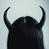 Small curved 3D printed demon horns supplied as a pair with a lightweight headband.