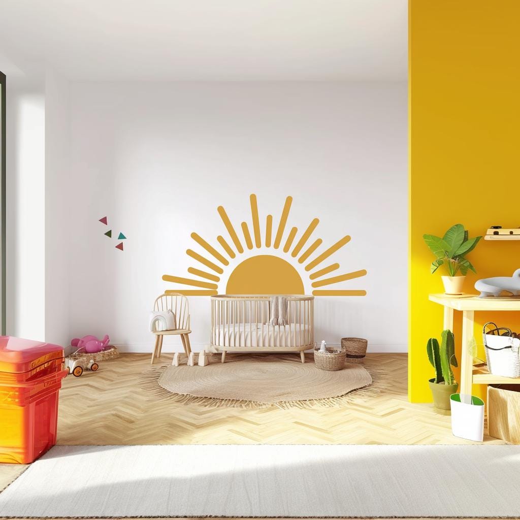 Large half sun wall decal in a bright nursery with wooden crib and playful decor, adding warmth to the room.