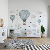 Printed vinyl wall artwork showing hot air balloons, clouds, stars and a crescent moon