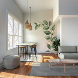 Printed vinyl wall decoration showing a tall botanical vine with leaves