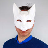 Japanese Kitsune Fox Mask featuring pointed ears, narrow eye openings and Japanese inspired details