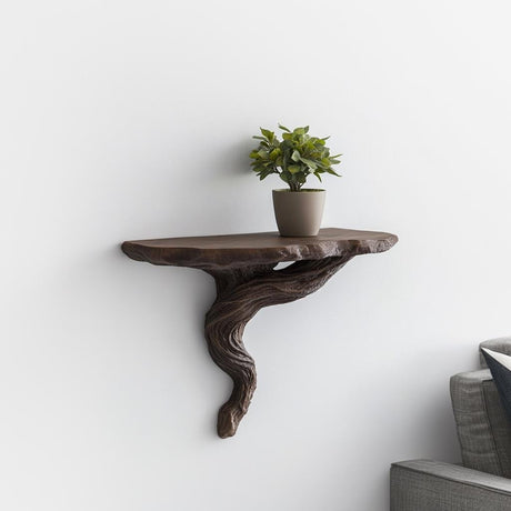 A brown 3D printed wall shelf shaped like a twisted tree root.