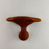 3D printed smooth mushroom wall shelf with rounded cap, sculpted stem and compact floating ledge