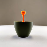 Floating Espresso Sculpture featuring suspended macchiato drop above a small cup