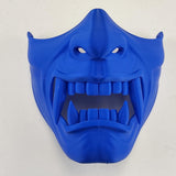 Oni Samurai Half Face Mask featuring fierce fangs and intricate detailing, worn by a man in a dark shirt
