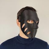 3D printed Black Horror Cosplay Mask with organic cutouts and a sleek and form fitting shape