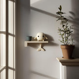 Whale Character Wall Shelf featuring small whale character on the ledge and a tail fin support beneath