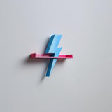 3D printed Lightning Bolt Wall Shelf with lightning bolt support beneath a floating display ledge