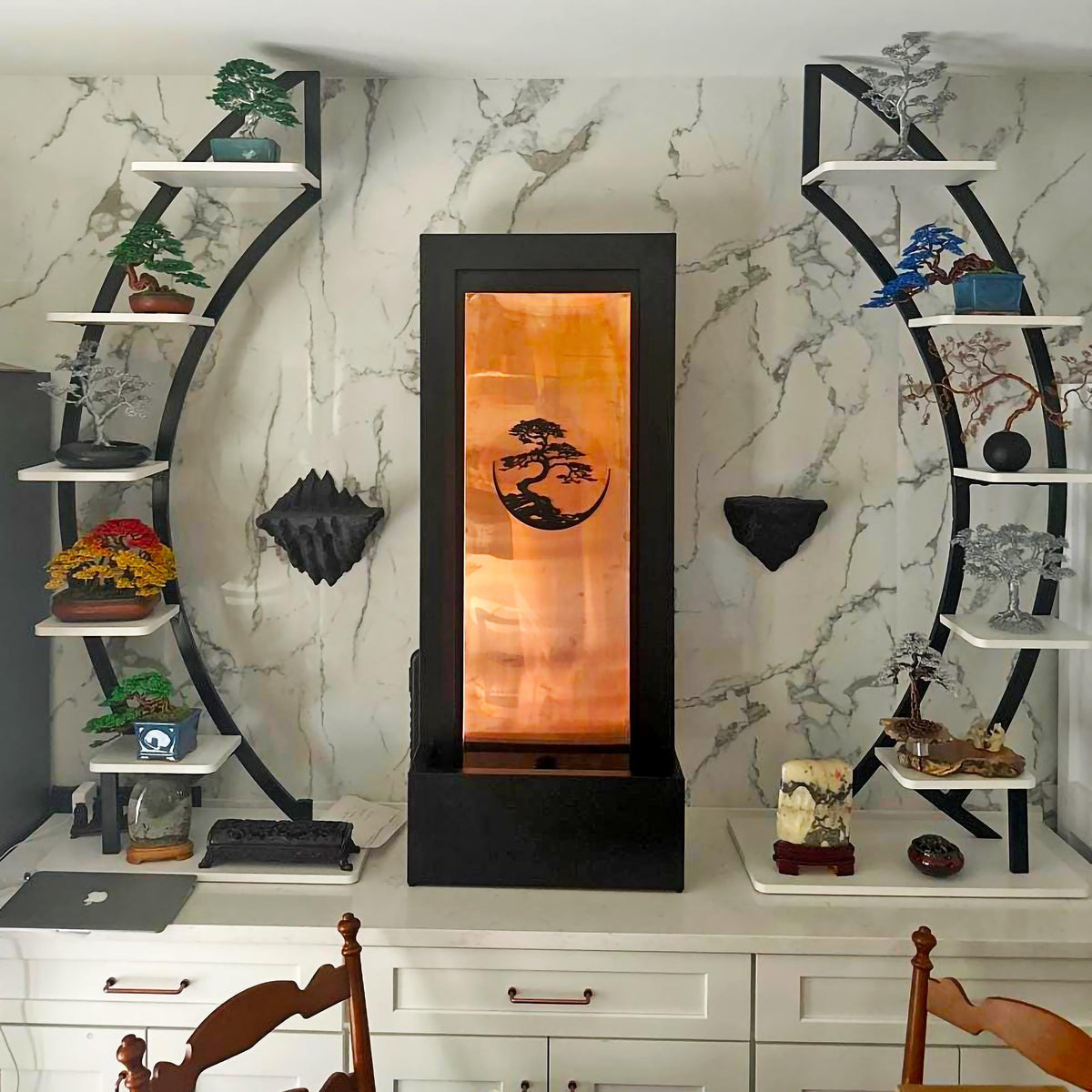 3D printed rock wall shelf with rugged, rock like texture and triangular shape