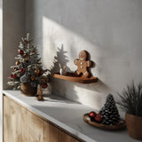Gingerbread Wall Shelf featuring gingerbread character integrated into a festive display ledge