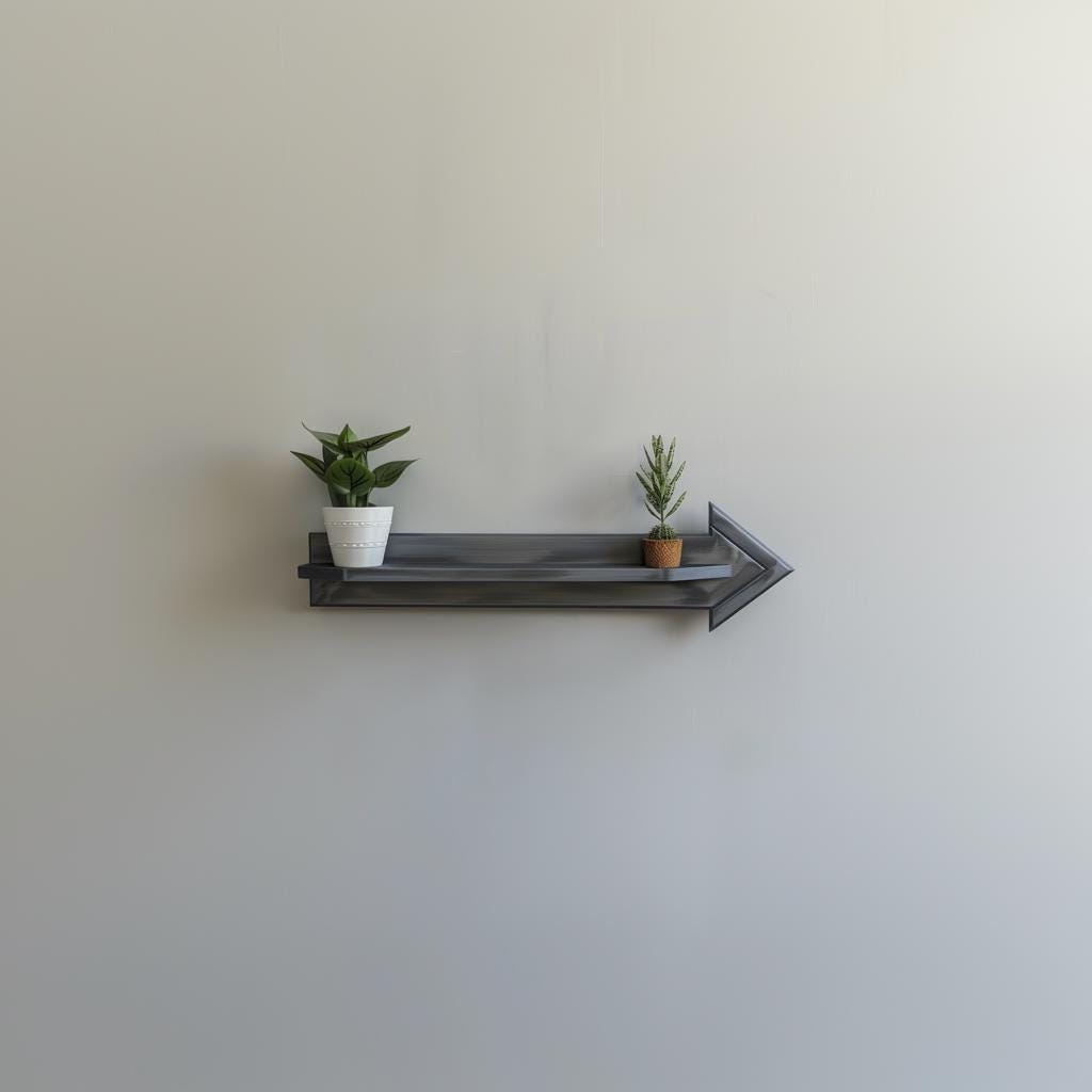 3D printed Directional Arrow Wall Shelf with geometric ledge and small plants