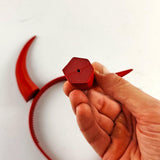 Decorative tall curved demon horns headband showing two tall textured horns with an upward curved fantasy silhouette