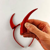 Product illustration of tall curved demon horns headband with two tall textured horns with an upward curved fantasy silhouette