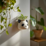 3D printed Panda Face Wall Planter with panda face wall pot with a top planting opening