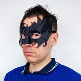 Gothic Masquerade Half Mask featuring dark sculptural patterns around the eyes and cheeks