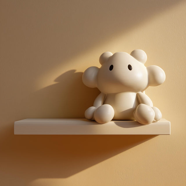 Cute Creature Wall Shelf featuring rounded creature figure integrated into the display ledge