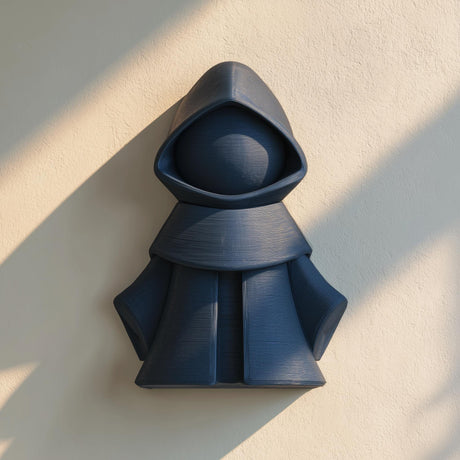 3D printed wall-mounted hooded figure with a faceless minimalist design.