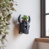 Viking Helmet Wall Planter featuring horned helmet design and small plant pot