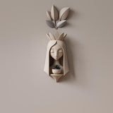 3D printed fairy face wall planter with an elongated face and crown shaped details
