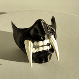 3D printed two color oni half face mask with contrasting fangs and a fierce demon expression