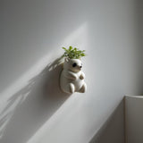 Full Body Panda Wall Planter with small green houseplant