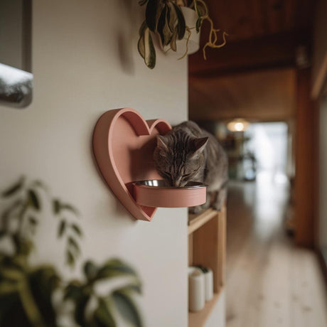 3D printed heart wall mounted pet bowl holder featuring a heart shaped backplate and circular bowl holder