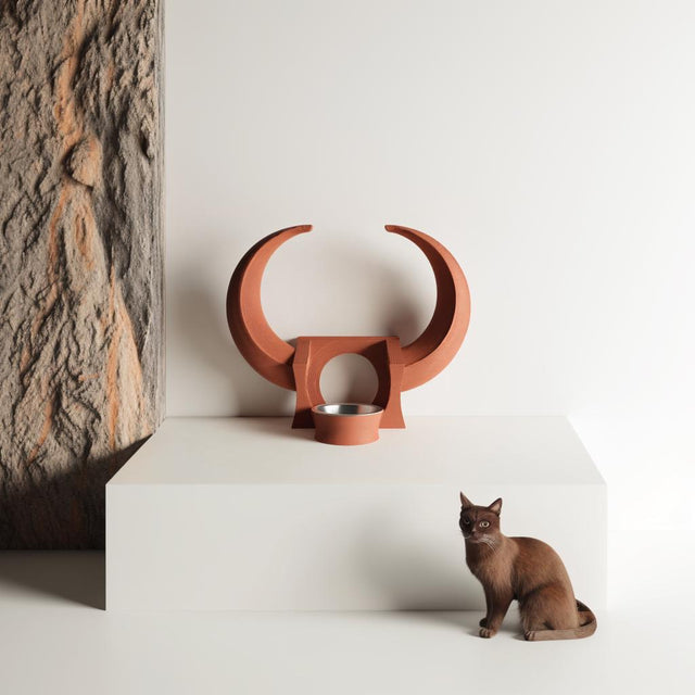 3D printed horned pet feeding bowl stand featuring two curved horns around a circular bowl opening