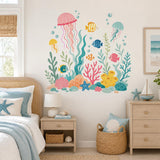 Design preview of ocean nursery wall decal depicting three jellyfish, five fish, coral, seaweed and bubbles