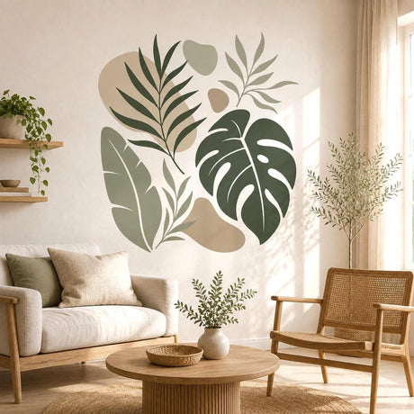 Tropical botanical wall decal with large green monstera and banana leaves beside soft beige abstract shapes.