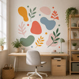 Illustrated abstract botanical wall sticker set with layered leaf branches and rounded abstract shapes in sage, coral and mustard