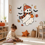 Printed vinyl artwork showing a friendly white ghost in an orange hat and striped scarf holding a pumpkin