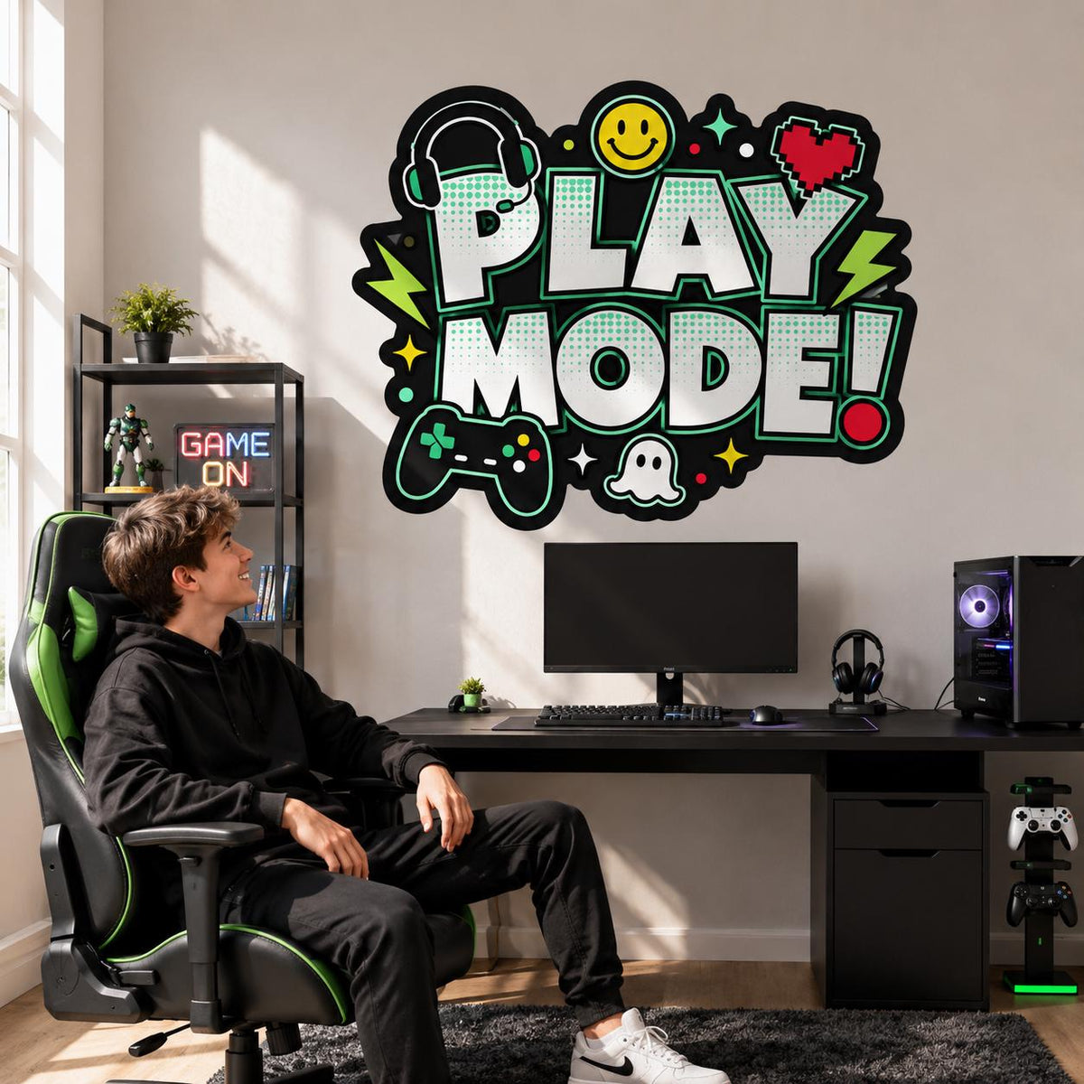 Play Mode gaming wall sticker above a computer desk, beside a person seated in a gaming chair.
