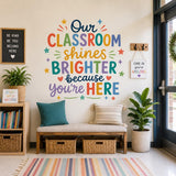 Illustrated classroom quote wall decal with the colorful words Our Classroom Shines Brighter Because You Are Here