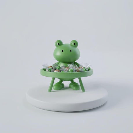 3D printed cartoon frog figure combined with a round decorative candy dish