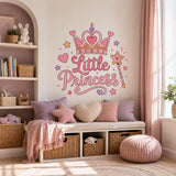 Little Princess wall decal above a blush cushioned window seat with heart pillows.