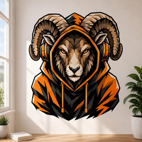 Illustrated ram gamer wall sticker with large curled horns, amber eyes, a black and orange hoodie and gaming headphones.