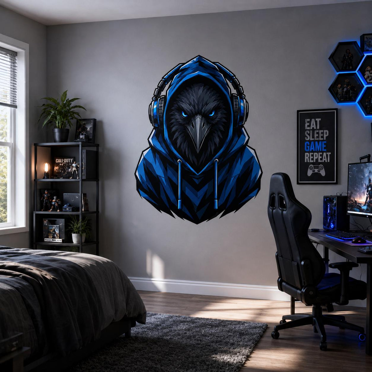 Raven gamer decal with headphones above a bed and black gaming chair in a blue-lit room.