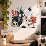 Black and white Halloween cats wall decal above a small desk with laptop and potted plant.
