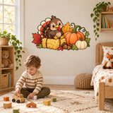Child playing with wooden blocks beneath a turkey and pumpkin wall decal in a nursery.