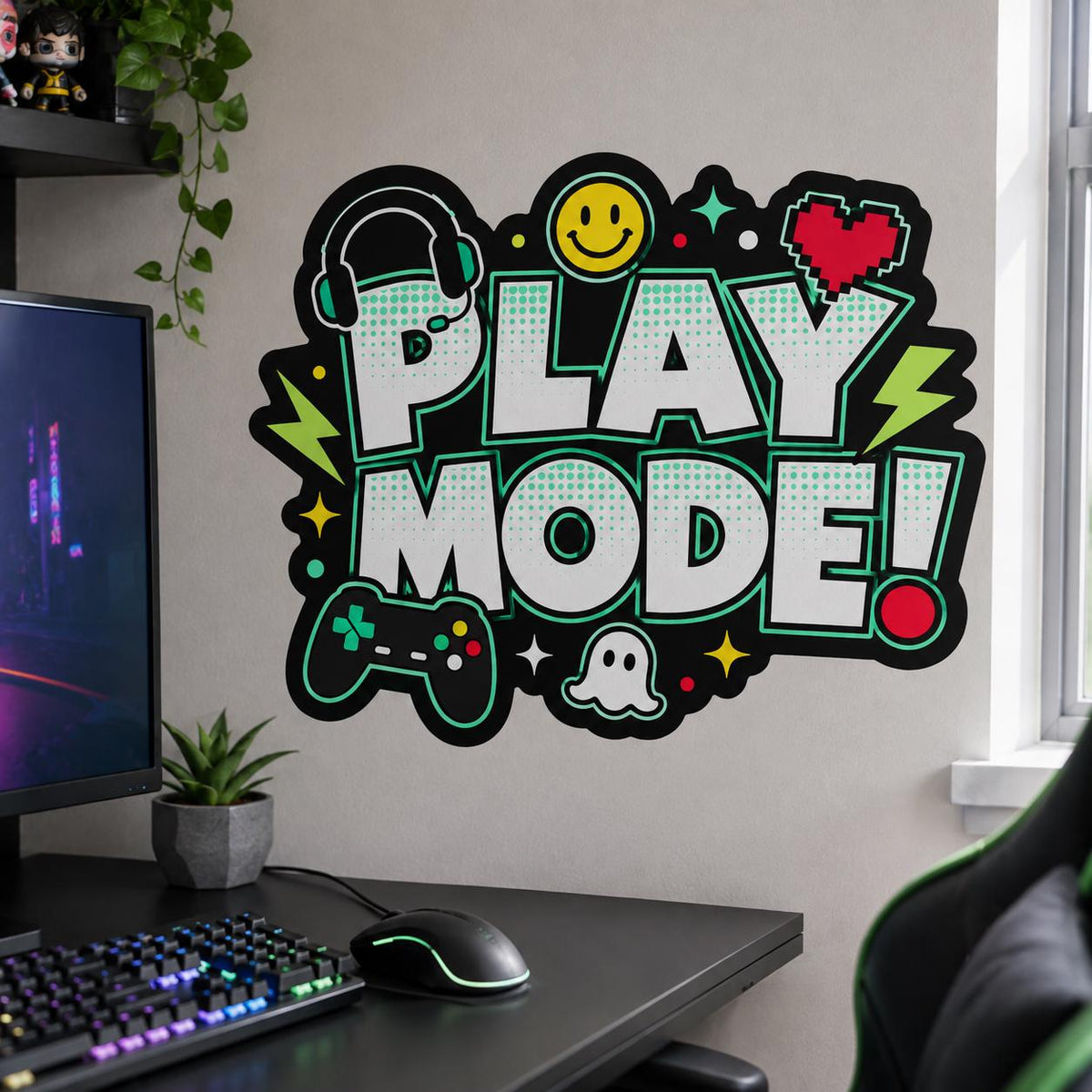 Play Mode wall decal above a black gaming desk with a monitor, keyboard and chair beside a window.