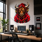 Bull gamer wall decal in a red hoodie above a gaming workstation with computer screens and speakers.