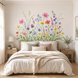Watercolor wildflower wall decal featuring pink, coral, yellow and violet meadow flowers among tall green grasses