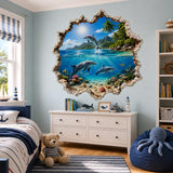 Design preview of tropical dolphin illusion wall decal showing three dolphins, turquoise water and colorful fish framed by a broken wall