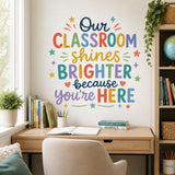 Design preview of classroom quote wall decal depicting the colorful words Our Classroom Shines Brighter Because You Are Here