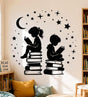 Black silhouette illustration of two children reading books while sitting on tall book stacks, surrounded by a crescent moon, scattered stars, sparkles, and small dots.
