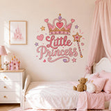 Little Princess pink lettering and crown wall sticker above a white bed in a pastel nursery.