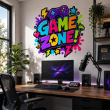 Bright Game Zone wall sticker above a gaming desk with a microphone, monitor and potted plants.