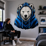 Person seated in a gaming chair below a blue hoodie polar bear wall decal.