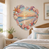 Heart beach sunset wall decal beside a bed with light blue bedding in a coastal bedroom.