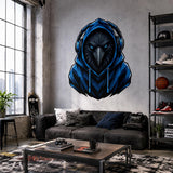Raven in cobalt-blue hoodie wall sticker above a gray sofa in an industrial loft.